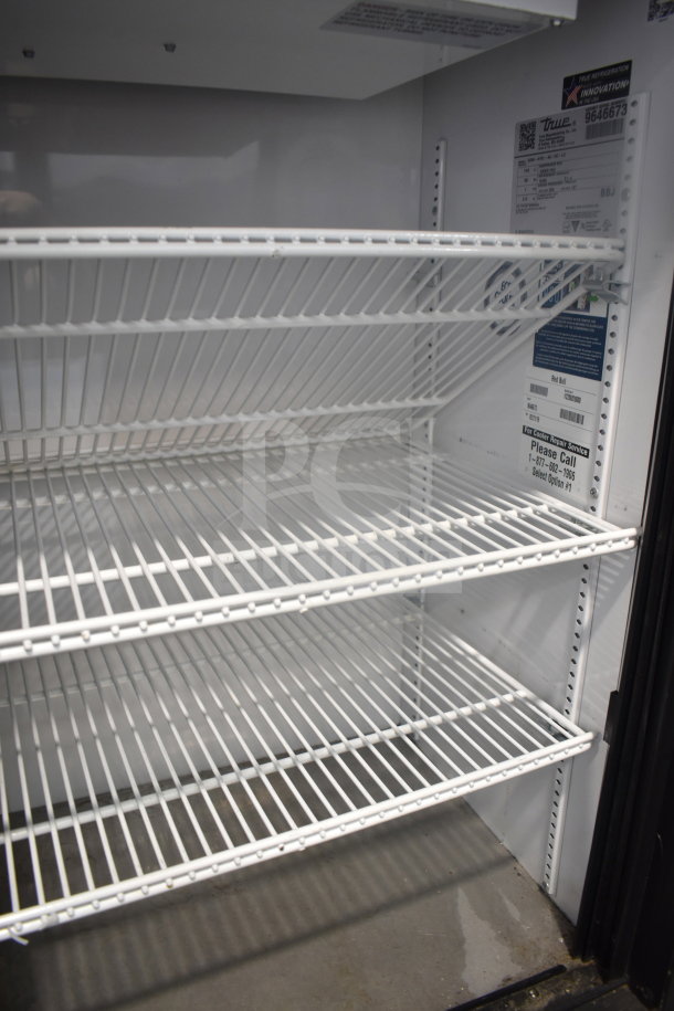2019 True GDM-41SL-48-HC-LD commercial cooler, two-door reach-in, 115V, 1 phase, clean interior, wire shelves, label details.