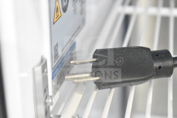 2024 QBD DC6LP-HC mini cooler plug and label, 115 volts, 1 phase, NSF certified, white interior with black power cord.