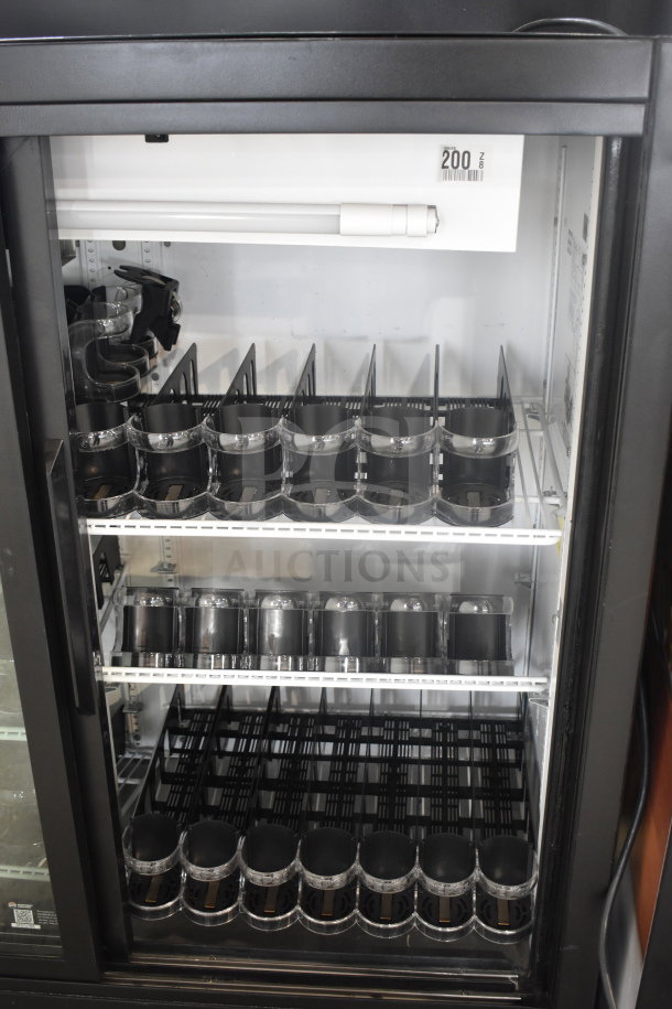 True GDM-41SL-54 2 Door Cooler, reach-in merchandiser, 115V, shelves, barcode visible, clean interior.