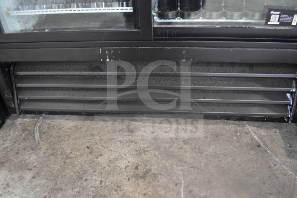 True GDM-41SL-54 2 door reach-in cooler merchandiser, black exterior, visible glass doors, 115 volts, 1 phase, good condition.