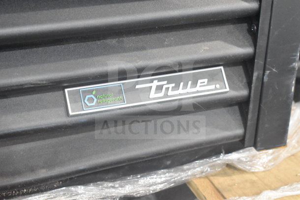 2022 True TVM-48SL-HC 2 Door Cooler with "natural refrigerant" label. Model: TVM-48SL-HC, 115 Volts, 1 Phase.