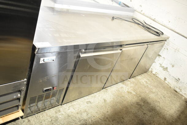 Brand new Avantco 178SSUD3R 3-door undercounter cooler with minor scratches, 115 volts, 1 phase, stainless steel.