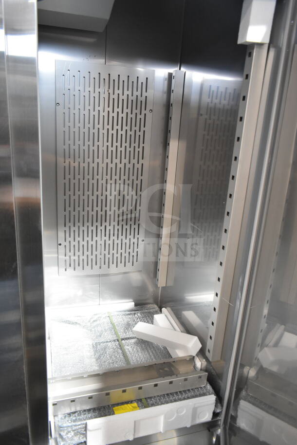 Avantco 178SS3FHC commercial 3-door freezer interior, brand new, with packing materials. Scratch and dent condition. 115V, 1 phase.