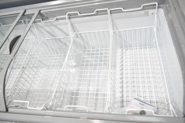New KoolMore KM-ISCF-78MD island chest freezer, 19 cu. ft., manual defrost, visible baskets and manual on commercial casters.