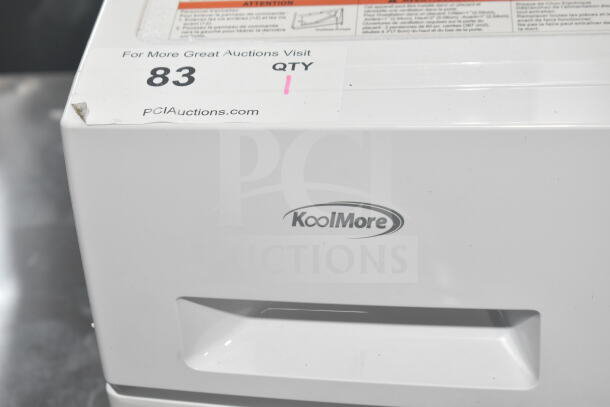 KoolMore FLC-3CWH washer dryer combo, 23-inch, 2.7 cu ft, brand new scratch and dent, logo and tag visible.