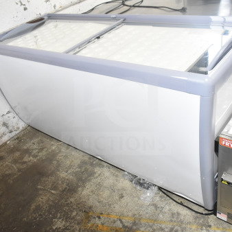 Brand new KoolMore KM-ICD-71SD ice cream dipping cabinet, 12 tubs, sliding glass doors, 20 cu. ft., 115 volts, minor dents visible.