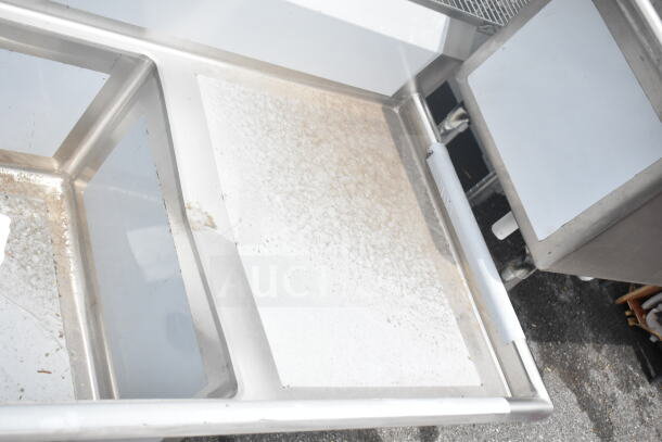 Regency 600S21824224 commercial 2 bay sink with dual drain boards, scratch and dent condition. Steel finish.