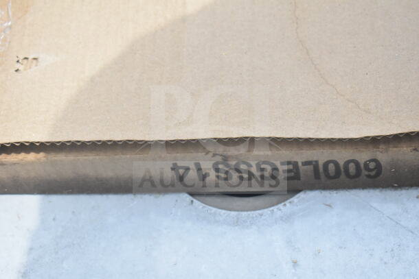 Cardboard box with visible model number "600LEGSS14" for Regency 600S21824224 Commercial 2 Bay Sink.