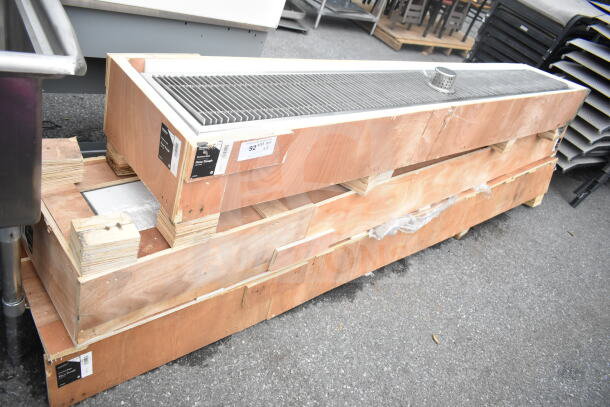 3 Regency stainless steel floor troughs with grates in original wooden crates. New, scratch and dent condition.
