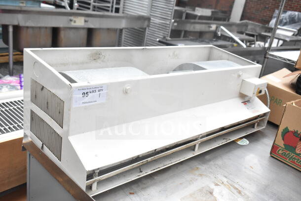 Dayton 6E825B Air Curtain Cabinet, white, visible wear, auction tag indicating lot number and quantity.