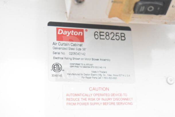 Dayton 6E825B Air Curtain Cabinet, galvanized steel, 38" size, serial 0205040142. ETL certified, made in Thailand.