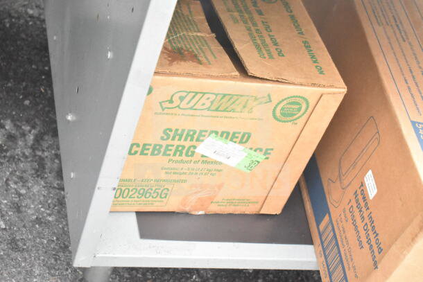 Duke Subway sandwich make line piece with baking pan liners, includes Subway-branded shredded lettuce box and dispenser box.