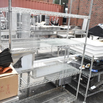 Chrome finish 4-tier wire shelving unit with wheels, excellent condition, buyer must dismantle.