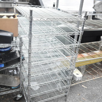 Chrome finish 8 tier wire shelving unit. Buyer must dismantle. Consider freight charges.