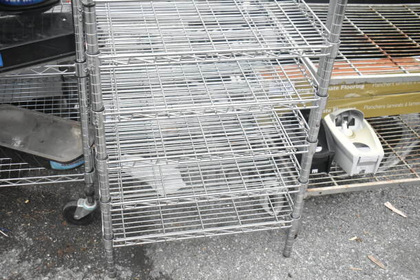 Chrome finish 8-tier wire shelving unit in good condition. Buyer must dismantle for shipping. Freight charges may apply.