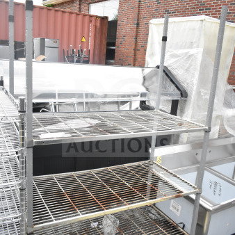 Gray 3-Tier Wire Shelving Unit, sturdy construction, minimal wear. Buyer must dismantle. Ideal for storage use.
