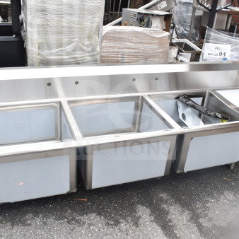 Regency 600S3242418R commercial 3-bay sink, right drain board, no legs, brand new with minor scratches.