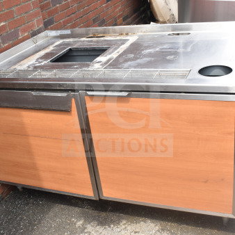 Duke SUBBD-60-LM Commercial Soda Station, stainless steel top, wood paneling, used condition, visible labeling, outdoor setting.