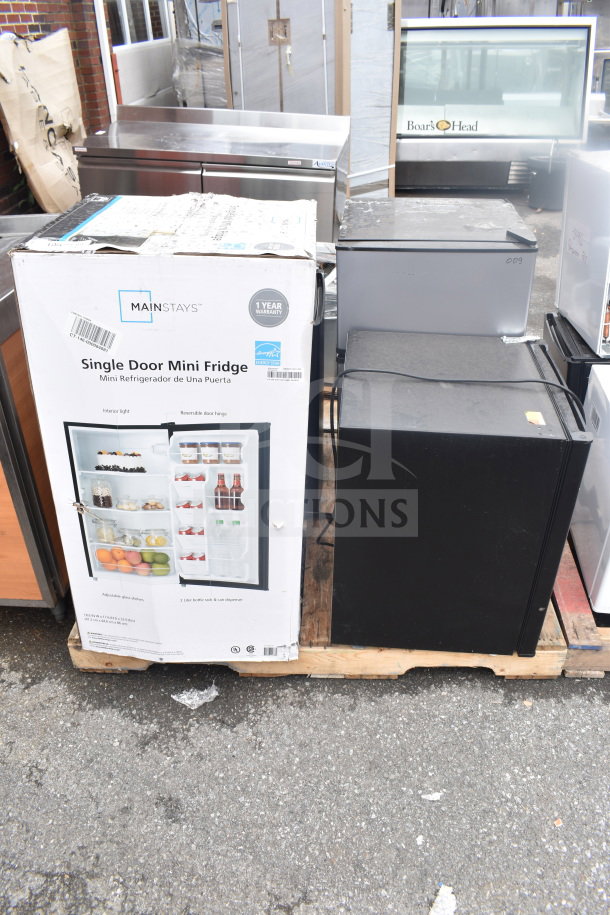 Four mini coolers including MainStays and Galanz models, 115 volts, 1 phase. MainStays cooler with original box.