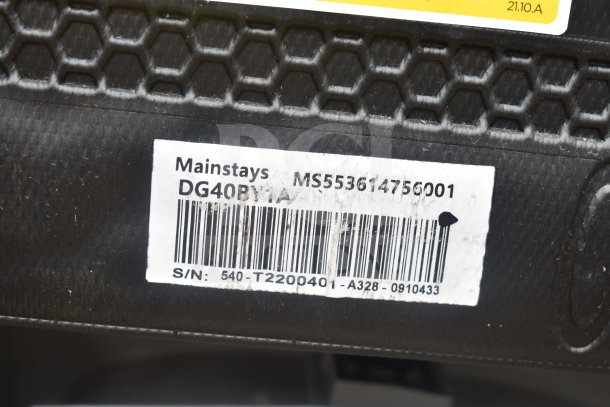 Label on MainStays mini cooler showing model DG40BY1A, barcode, and serial number, 115 volts, 1 phase.