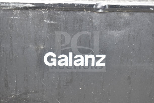 Galanz GL31BKE mini cooler with freezer, 120V, 1 phase, black exterior, visible Galanz branding.