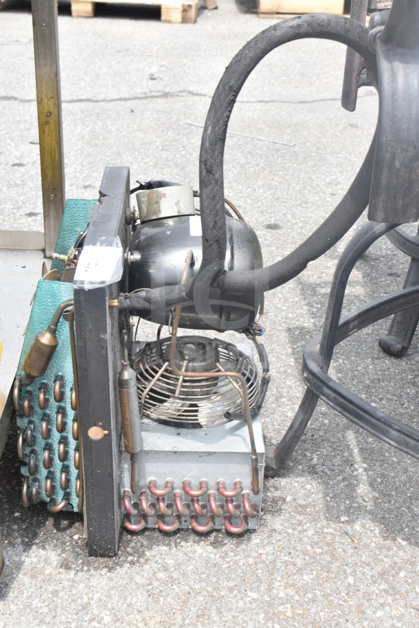 Embraco FFI 12HBX Compressor, 220 Volts, visible wear, features copper coils, mounted fan, and multiple wiring components.