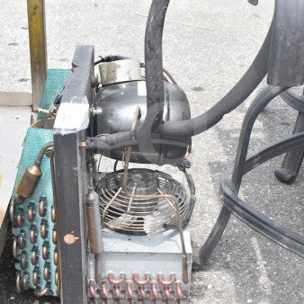 Embraco FFI 12HBX Compressor, 220 Volts, visible wear, features copper coils, mounted fan, and multiple wiring components.