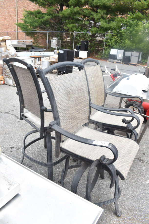 Three outdoor armchairs with metal frames and woven mesh seats, displaying light wear. Ideal for patio use.