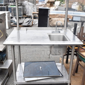 Stainless steel commercial table with sink bay, over shelf, and under shelf; durable and ideal for kitchen use.