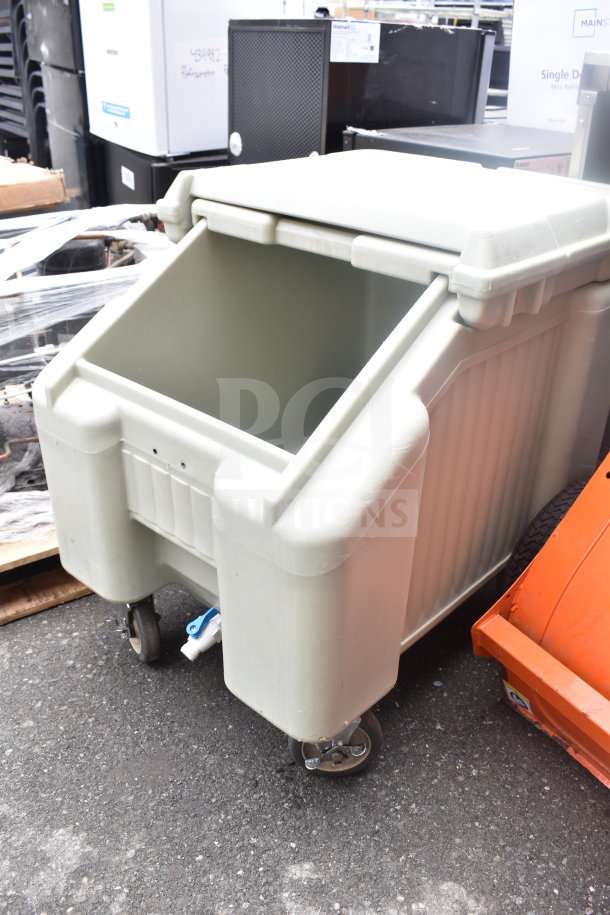 Poly portable ice bin on commercial casters, no lid, light beige, durable design, used condition, ideal for storage needs.