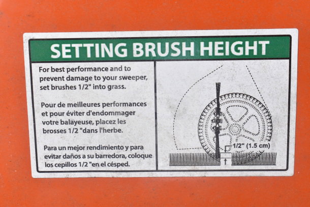Agri-Fab Lawn Mower Brushing Attachment label, showing brush height setting instructions in English, French, and Spanish.