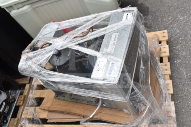 Copeland FFAL-017Z-CFV-079 compressor wrapped, 208-230V, 1 phase, new condition with visible labels, on pallet.
