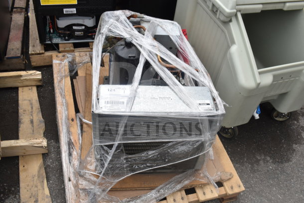 Copeland FFAL-017Z-CFV-079 compressor, 208-230V, 1 phase, wrapped for shipping. Model and specs label visible.