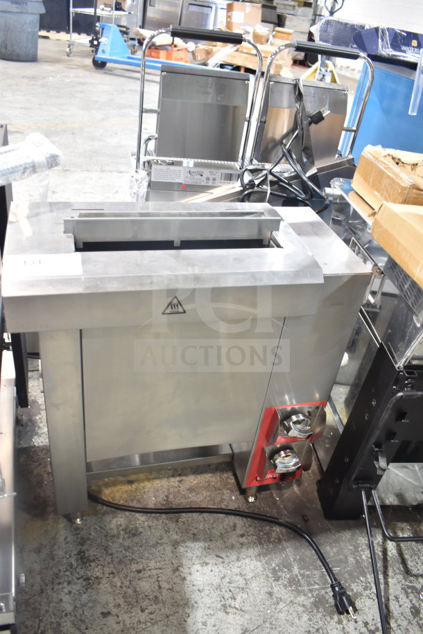Brand new Avantco CPBTR66B Compact Vertical Contact Bun Toaster, 208V. Slight scratches, stainless steel finish, visible caution label.