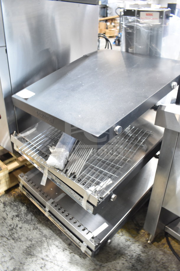 BRAND NEW ServIt 423OAM65D 24" heated display merchandiser, 2 shelves, countertop model, 120V, minor scratches, packaged.