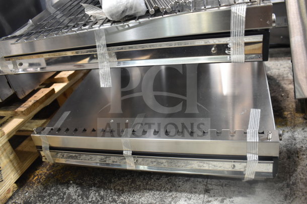 Brand new ServIt 423OAM65D 24" heated display merchandiser, slanted 2-shelf, 120V, visible packaging straps, countertop design.