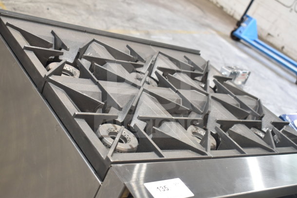 BRAND NEW SCRATCH AND DENT Vulcan 36C-6BP 6-Burner 36" Liquid Propane Range, 215,000 BTU, convection oven base, tags visible.