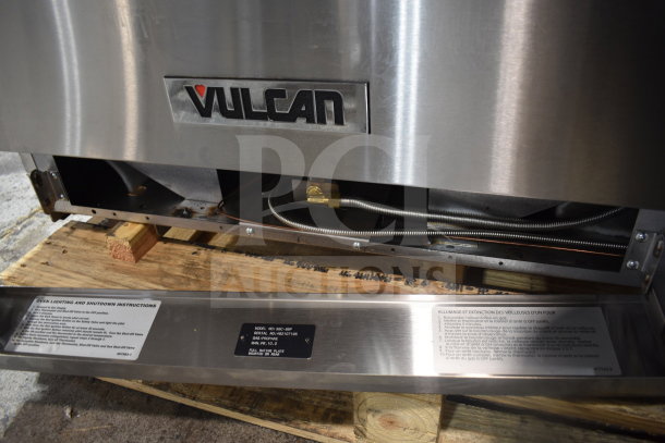 Brand new Vulcan 36C-6BP 6 burner 36" range with convection oven, 215,000 BTU. Scratch and dent condition, base labels visible.