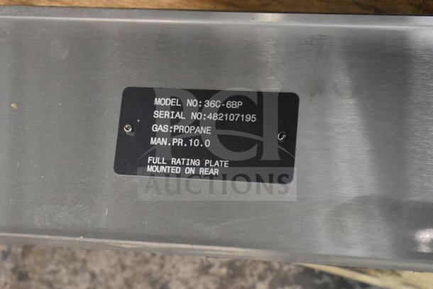 BRAND NEW Vulcan 36C-6BP 6 Burner Range tag showing model, serial numbers, gas type, and pressure info.