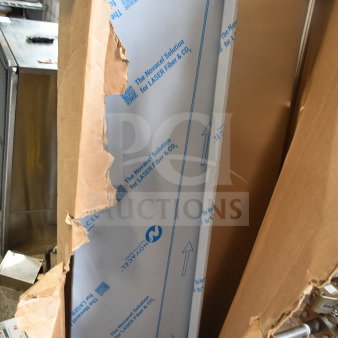 Brand new Imperial shelf with minor scratches and dents. Partially unboxed, protective film visible. Auction tag "137" attached.