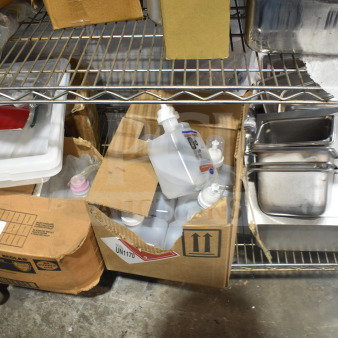 Tier lot including various items like drop-in bins and alcohol foam hand sanitizer. Boxes and bins on metal shelf.