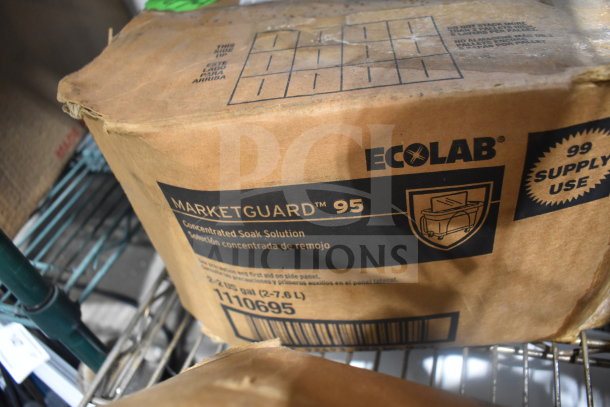 Cardboard box labeled "ECOLAB MarketGuard 95" contains concentrated soak solution. Box shows wear.