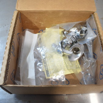 BRAND NEW T&S B-0512 concealed mixing faucet, 3" wall mount, 3/8" NPT inlets/outlet, 4-arm handles, in original packaging.