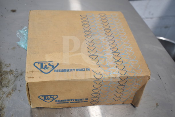 Brand new T&S B-0840 deck mount sill faucet in box, labeled as scratch and dent. Box shows minor wear, "Reliability Built In" logo visible.