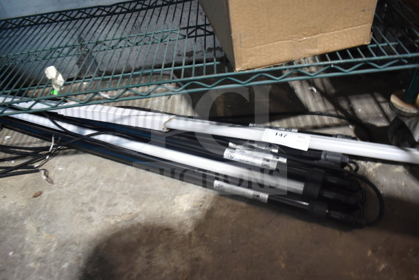 7 G&G VPX4-40K-277V lights bundled together, new condition, on wire shelf with visible model labels.