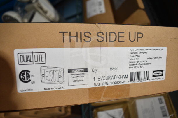Box with DualLite exit sign label, showing model EVCURWDI-0-WM, emergency operation, white finish, and red letters.