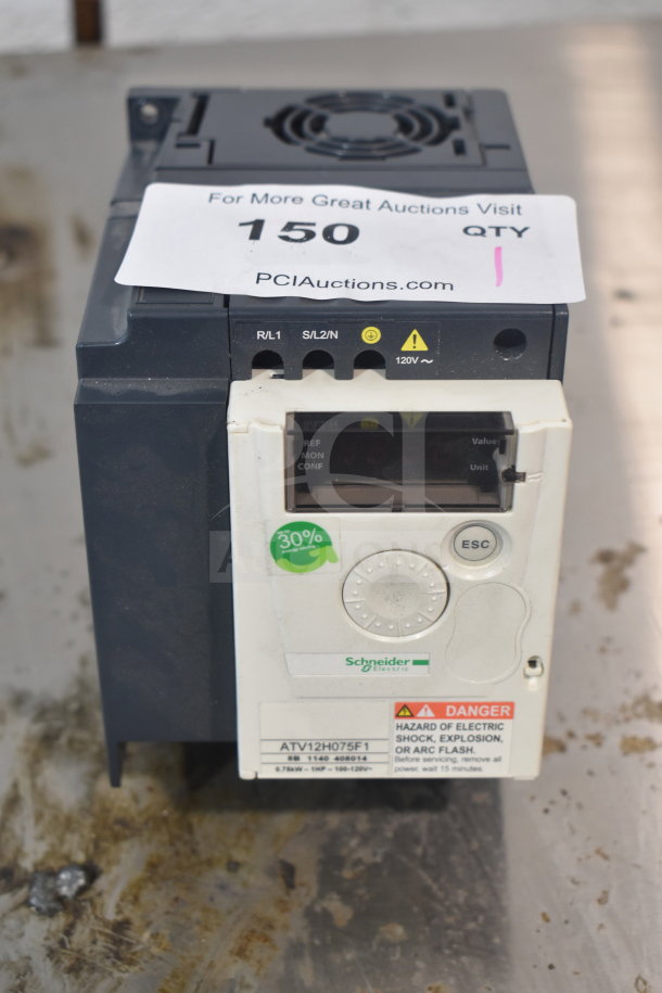 Altivar ATV12H075F1 Variable Speed Drive; features control panel, hazard warning label, 0.75kW, 120V; good condition.
