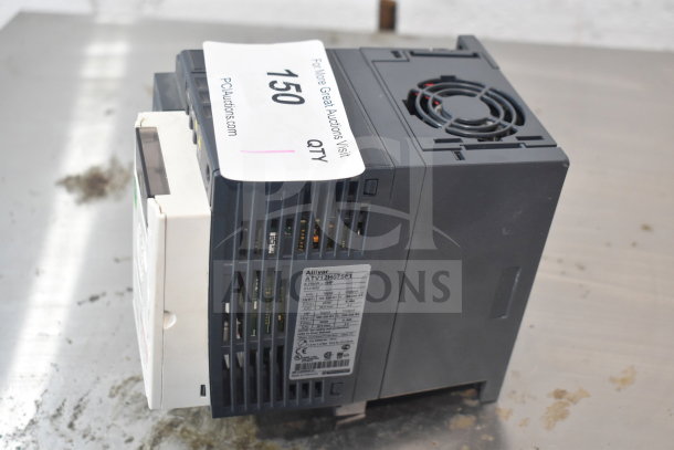 Altivar ATV12H075F1 variable speed drive, black casing, visible labels with specifications, good condition.
