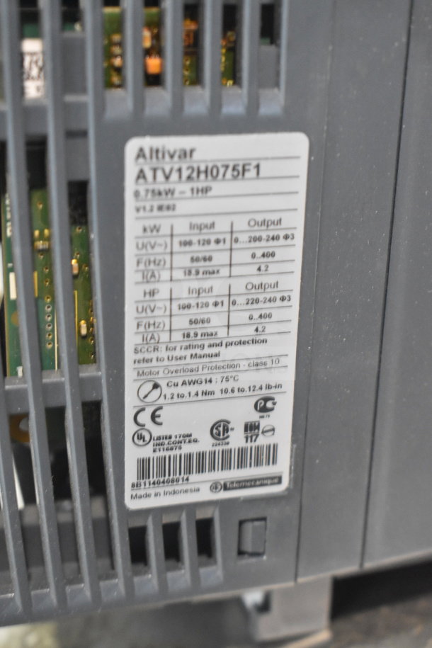Altivar ATV12H075F1 variable speed drive, 0.75kW, 1HP, label shows input-output specs, made in Indonesia.