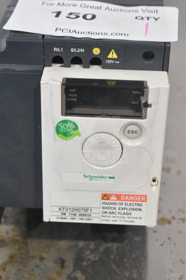 Altivar ATV12H075F1 Variable Speed Drive, energy-saving sticker, Schneider Electric branding, visible hazard warning.